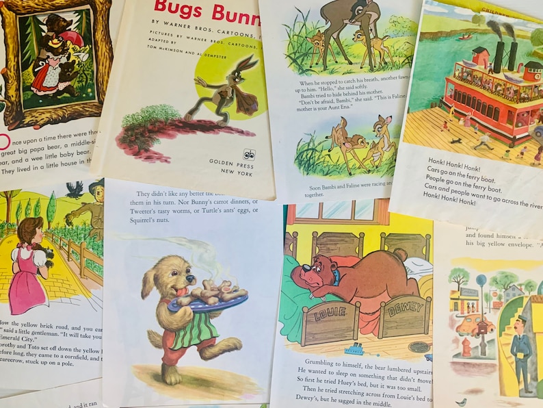 May include: A collection of vintage children's books featuring colorful illustrations. The books showcase classic characters like Bugs Bunny, Bambi, and characters from The Wizard of Oz. The pages display text and vibrant artwork, evoking a sense of nostalgia.