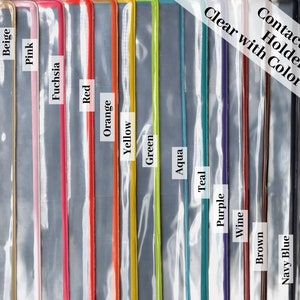 May include: A set of clear plastic contact card holders with colored trim. The trim colors are gray, beige, pink, fuchsia, red, orange, yellow, green, aqua, purple, wine, brown, navy blue, and black.
