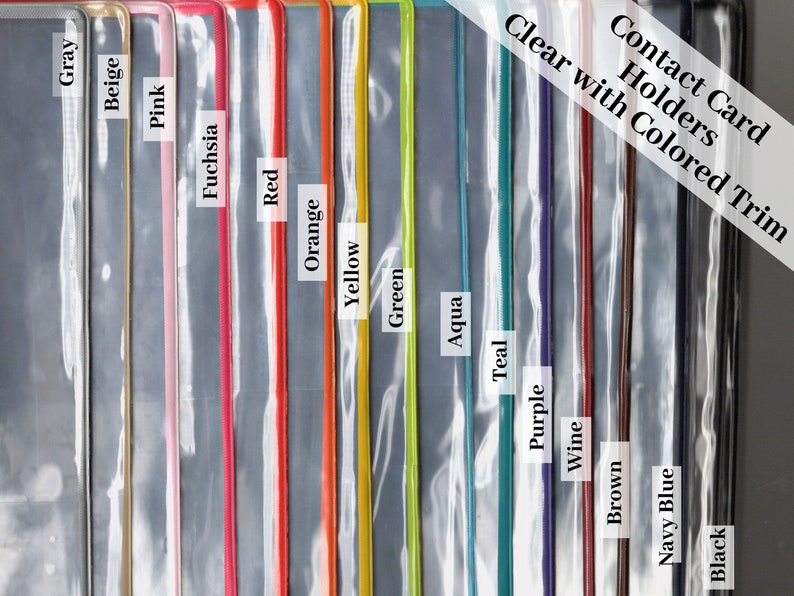May include: A set of clear plastic contact card holders with colored trim. The trim colors are gray, beige, pink, fuchsia, red, orange, yellow, green, aqua, purple, wine, brown, navy blue, and black.