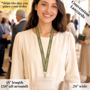 May include: A woman wearing a green lanyard with the text "Eternal Happiness" repeated. The lanyard is 18 inches (45.72 cm) long and .70 inches (1.78 cm) wide. The lanyard has a clear plastic badge holder and a silver-colored clasp. The image is labeled "Convention Lanyards".