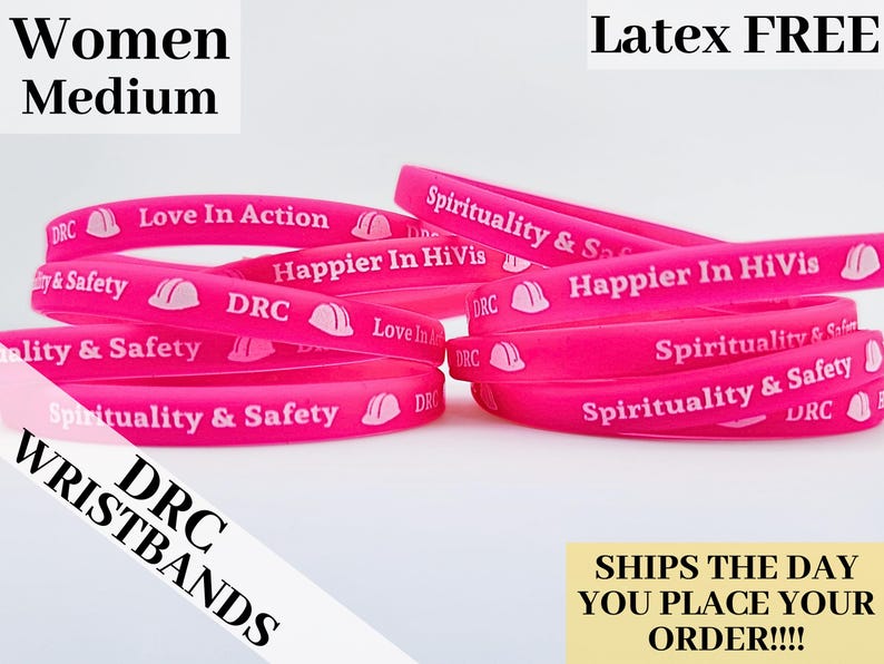 May include: Pink silicone wristbands with various messages, including "Love In Action", "Happier In HiVis", and "Spirituality & Safety". The wristbands are labeled "DRC Wristbands" and are latex free.