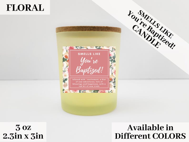 May include: A 3 ounce floral candle with a pink and white floral design label. The label reads "Smells Like You're Baptized!" and "Infused with excitement, a hint of new adventures, lots of blessings and happiness, with a tad bit of new trials."