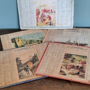 May include: Four vintage French Almanach des Postes et des Télégraphes calendars from 1925, 1938, and 1939. The calendars feature illustrations of a castle, a mountain scene, and a group of people by a lake.