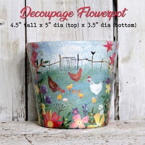 May include: A decoupage flowerpot with a whimsical design featuring chickens, a gate, and a field of flowers. The pot is 4.5 inches tall, 5 inches in diameter at the top, and 3.5 inches in diameter at the bottom.