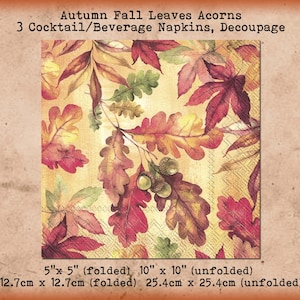 May include: Square cocktail napkins with a fall leaves and acorn design. The napkins are decorated with red, yellow, and green leaves. The text on the image reads "Autumn Fall Leaves Acorns" and "3 Cocktail/Beverage Napkins, Decoupage". Folded size is 5" x 5".