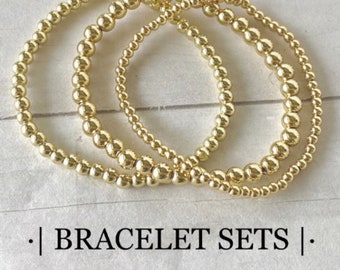 Bracelet de perles d'or, Pile de bracelets de perles d'or, Bracelet boules d'or, Bracelet de perles d'or, Pile de bracelets d'or, Parures de bracelets pour femme or