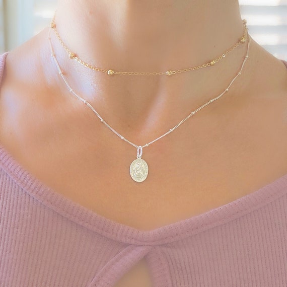 Patron saint of travel necklace shop
