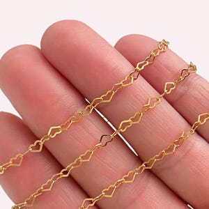 May include: Gold heart-shaped chain, a delicate and stylish jewellery finding, perfect for crafting necklaces, bracelets, or anklets.