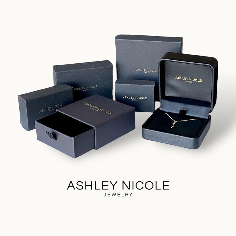Ashley Nicole Jewelry elegant navy gift boxes showing jewelry packaging options for 18K PVD gold CZ pendant necklace order