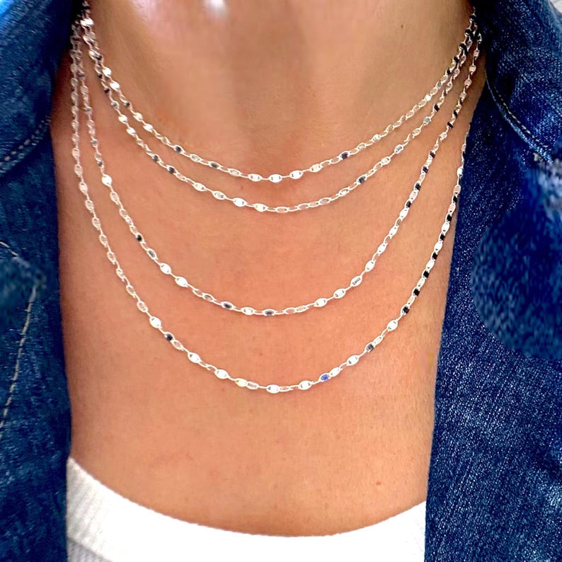 Sparkling Solid 925 Italian Sterling Silver Valentino Link style chain, shown layered on a model wearing the 15” 16” 18” and 20” lengths stacked.