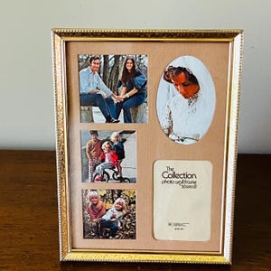 May include: A gold-toned metal collage photo frame with a textured border. The frame features a beige mat with four rectangular openings and one oval opening. The oval opening displays a bride, while the others show family photos. Text reads The Collection photo wall frame by Intercraft.