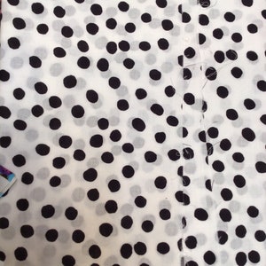 Black and white polka dot fabric