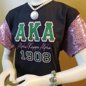 Camiseta de hermandad con mangas de lentejuelas
