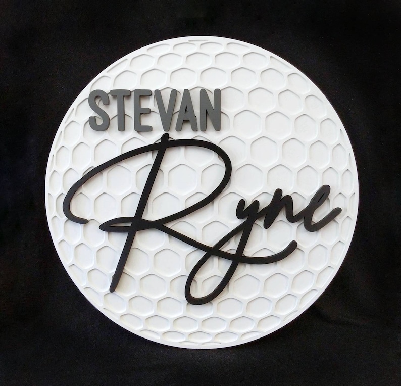 circle wood sign has golf ball shape with your chosen name on solid color background is the best golf gift for husband