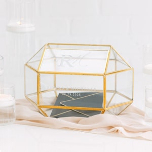 Glass geometric card box with gold frame