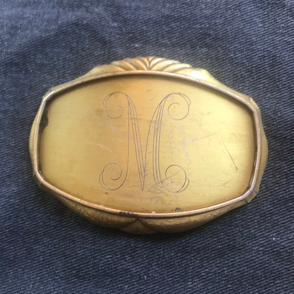 Belt buckle, Raintree 1978 with letter M