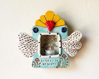 Nicho, Shrine with wings