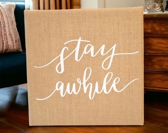 Stay Awhile Rustic Farmhouse Hand Lettered Calligraphy Quote on Burlap Canvas
