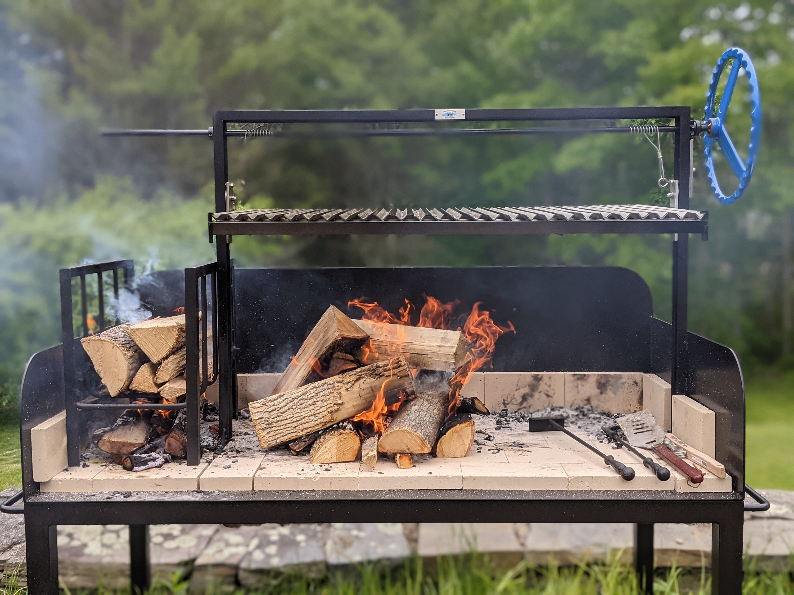 Parrilla Argentina, traditional barbecue made with ember straight from the  wood Stock Photo - Alamy