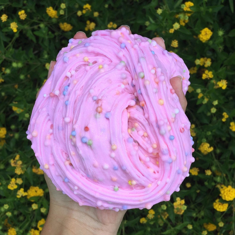 May include: Pink slime with colorful sprinkles, a popular sensory toy for kids and adults.