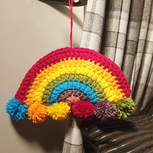 Rainbow crochet wall hanging; crochet rainbow; home decor; rainbow home decor; rainbow pompom; pompom home decor; home accessories