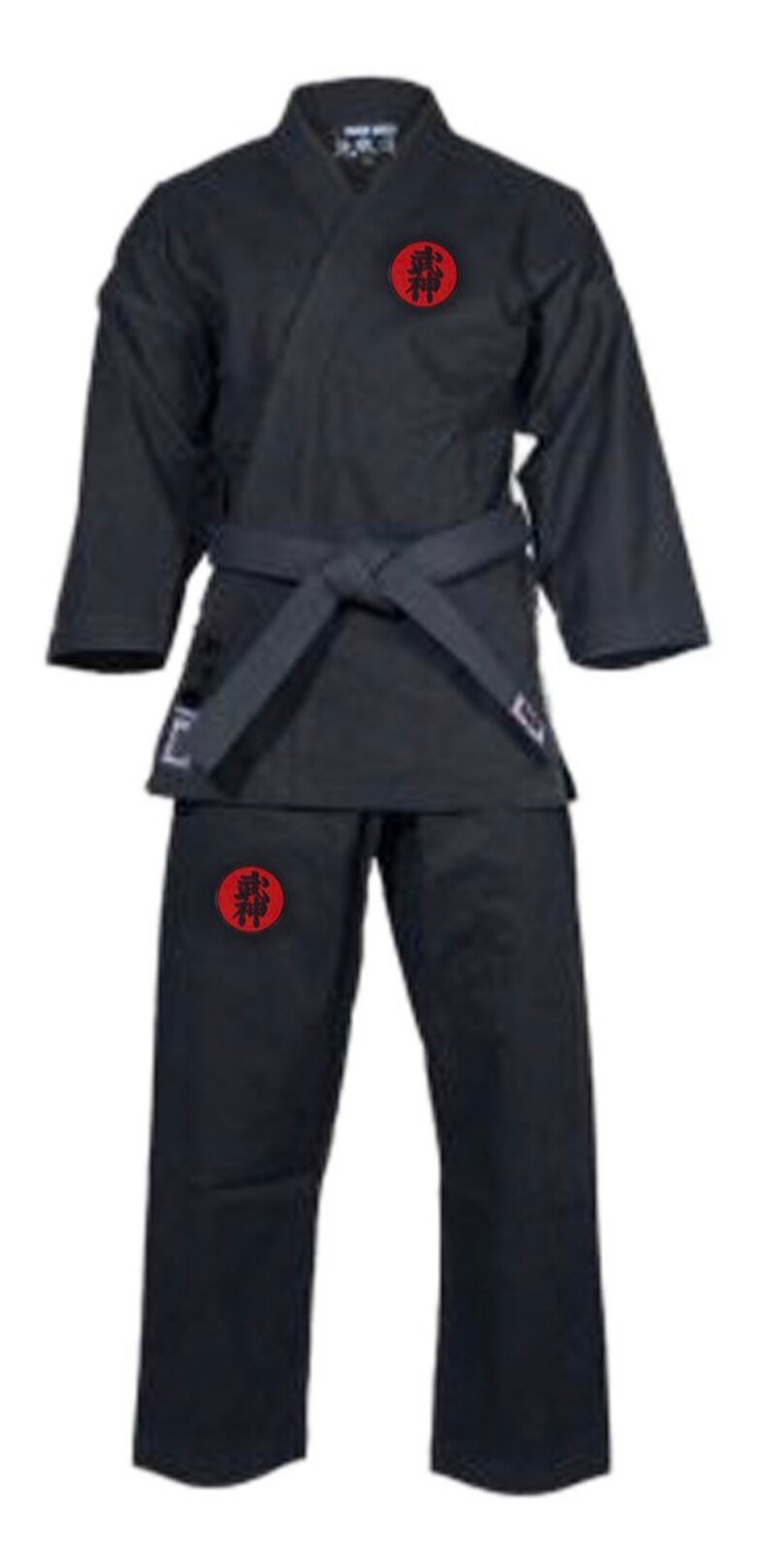 May include: Black martial arts uniform with a red circle and black kanji on the chest and left leg. The uniform includes a jacket with a black belt and matching trousers.