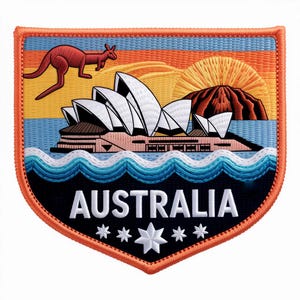 Peut inclure: Écusson brodé représentant l'Opéra de Sydney, un kangourou rouge et le mot "AUSTRALIA" en blanc. Le patch présente un design coloré avec un coucher de soleil, des vagues et une montagne. Bordure orange.