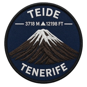 May include: A circular embroidered patch with a dark blue background featuring a brown mountain with a white snow-capped peak. The text reads TEIDE at the top and TENERIFE at the bottom in white, with 3718 M and 12198 FT printed in the center.
