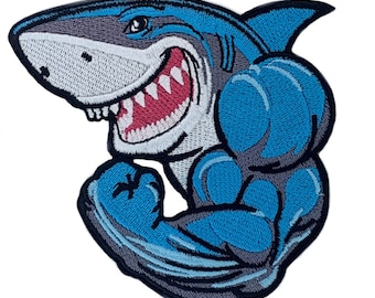 May include: A blue and gray embroidered iron-on patch of a cartoon shark flexing its bicep.