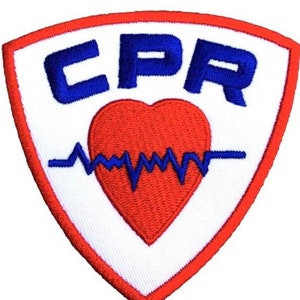 May include: White embroidered patch with a red heart, a blue EKG line, and the text "CPR" in blue letters.