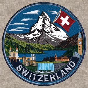 May include: Embroidered patch featuring a Swiss landscape with a snow-capped mountain, lake, and waterfall. A Swiss flag waves in the sky. The word "SWITZERLAND" is arched across the bottom in white letters.