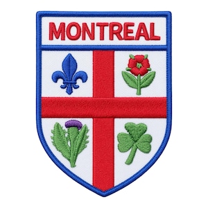 Op de afbeelding: Een schildvormige geborduurde patch met het woord MONTREAL in rode letters bovenaan. De witte achtergrond is verdeeld door een rood kruis, met een blauwe fleur-de-lis, een rode roos, een paarse distel en een groen klaverblad in de kwadranten.