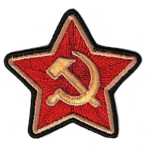May include: A red embroidered star with a gold hammer and sickle in the center.