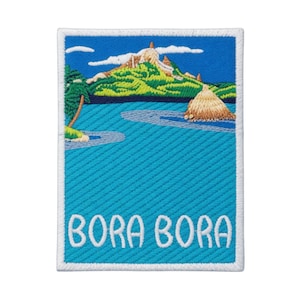 May include: Embroidered patch featuring a tropical island scene with the text "BORA BORA". The design includes a mountain, a thatched-roof structure, palm trees, and turquoise water, all framed by a white border.