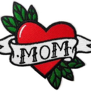 May include: Red heart with a white banner that says "MOM" and green leaves on either side.