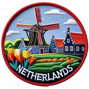 May include: Embroidered patch featuring a Dutch windmill, houses, and tulips. The patch is circular with a red border and the word "NETHERLANDS" in white. The design includes a blue sky with clouds.