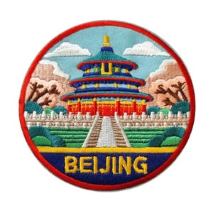 May include: Embroidered patch featuring a colorful illustration of the Temple of Heaven in Beijing. The patch has a red border and includes the word "BEIJING" in yellow letters. The design incorporates blue, red, yellow, and green.