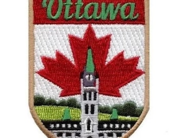 May include: Embroidered patch with a tan background, a red maple leaf, a white building with a green steeple, and the text "Ottawa" in green letters.