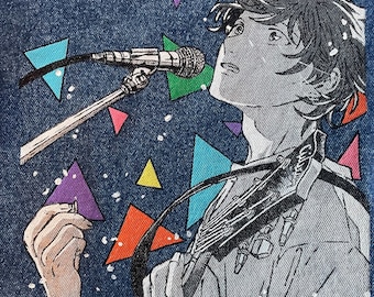 May include: A black and white illustration of a person singing into a microphone with a guitar in their hand. The background is a denim fabric with colorful geometric shapes.