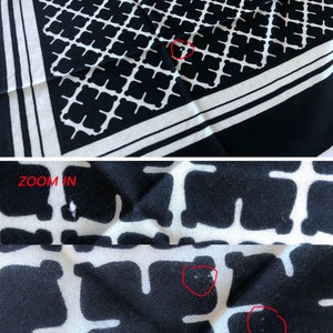 May include: Black and white patterned scarf with a geometric design. The scarf has a repeating pattern of black shapes on a white background, with a contrasting black border. The text "B : with small holes" and "ZOOM IN" are visible.