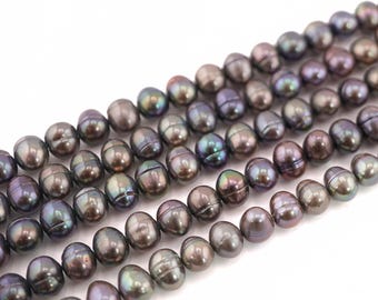 Peacock Potato Freshwater Pearl Strand: Rainbow Iridescent Beads