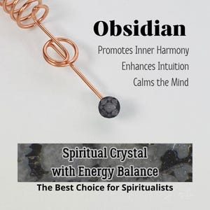 May include: A copper-coloured wire wrapped around a black obsidian crystal. The image includes text that reads "Obsidian" and "Spiritual Crystal with Energy Balance". The text also states that obsidian promotes inner harmony, enhances intuition, and calms the mind.