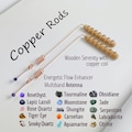2 Copper Dowsing Rods with Crystals, wooden handles in a copper coil product logo