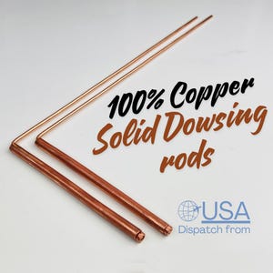 May include: Two copper dowsing rods with a bent L-shape. The rods are made of solid copper and are labeled "100% Copper Solid Dowsing rods". The image also includes the text "USA".