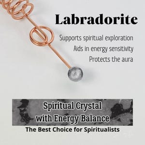 May include: A Labradorite crystal with copper wire accents. The image includes text that reads "Supports spiritual exploration, Aids in energy sensitivity, Protects the aura." Additional text reads "Spiritual Crystal with Energy Balance, The Best Choice for Spiritualists."