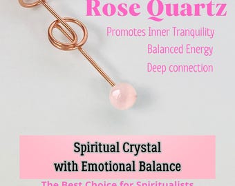 May include: A rose quartz crystal on a copper wire spiral. The text "Rose Quartz" is in pink letters at the top of the image. The text "Promotes Inner Tranquility, Balanced Energy, Deep connection" is below the title. The text "Spiritual Crystal with Emotional Balance" is in a pink rectangle at the bottom of the image. The text "The Best Choice for Spiritualists" is below the rectangle.