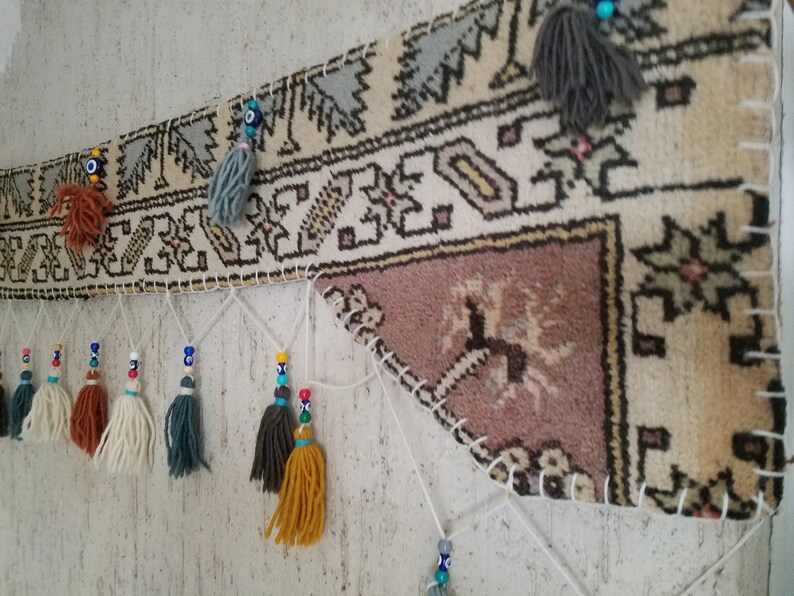 Farmhouse Rug Wall Hanging Decor With Tassel And Evil Eye Image 0