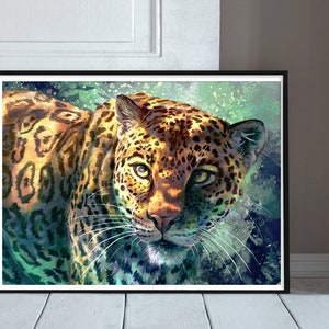 May include: A close-up of a jaguar's face, with a green and blue watercolor background. The jaguar's fur is a mix of brown, yellow, and black, with spots and stripes. The jaguar's eyes are bright and alert, and its whiskers are long and prominent.