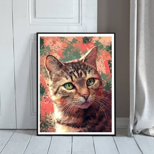 May include: A close-up portrait of a tabby cat with green eyes. The cat is looking directly at the viewer. The background is a colorful abstract design with splashes of red, orange, green, and blue.