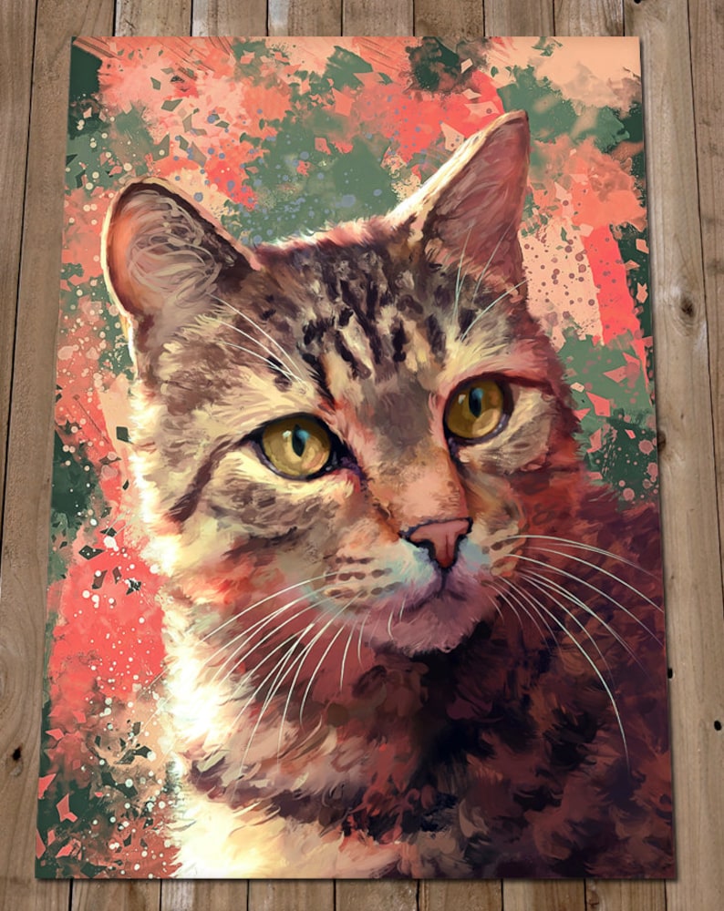 May include: A close-up portrait of a tabby cat with green eyes. The cat is looking directly at the viewer. The background is a colorful abstract design with splashes of red, orange, and green.